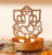 Golden Finish Metal Lord Ganesha Tealight Holder by Anasa Rs.49 – Pepperfry